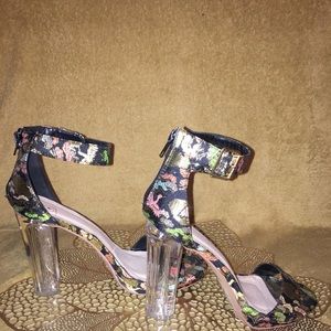 Black with multicolor pattern and a clear heel